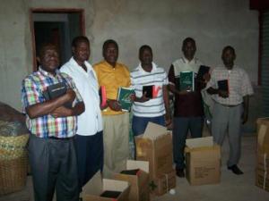 Receiving Bibles to distribute in their Regions of ministry